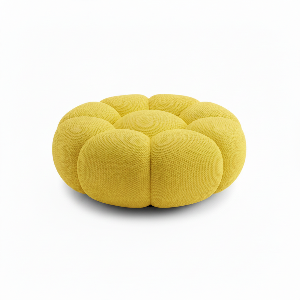 Cielmont Bellac Stool side profile showing rounded upholstered pouf shape and piped seams on a white background