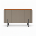 Coralie Sideboard front view showing the curved cabinet, saddle leather top, dark handles, and stainless steel legs on a white background.