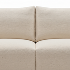 Fiorenne Loveseat ivory fabric center cushion and back cushion seam close-up
