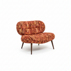 Foscelle Accent Chair with upholstered seating, a rolled backrest, curved arms, and a supportive base on a white background.