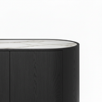 Galian Sideboard close-up of the natural marble top veining and rounded stone edge.