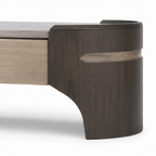 Iveronne Coffee Table rounded wood support, curved base and contrasting detail close-up