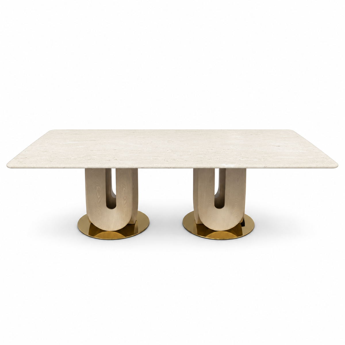 Verona dining table with a cream rectangular tabletop, two light wood-tone curved U-shaped pedestals and separate circular gold bases, full front view on white