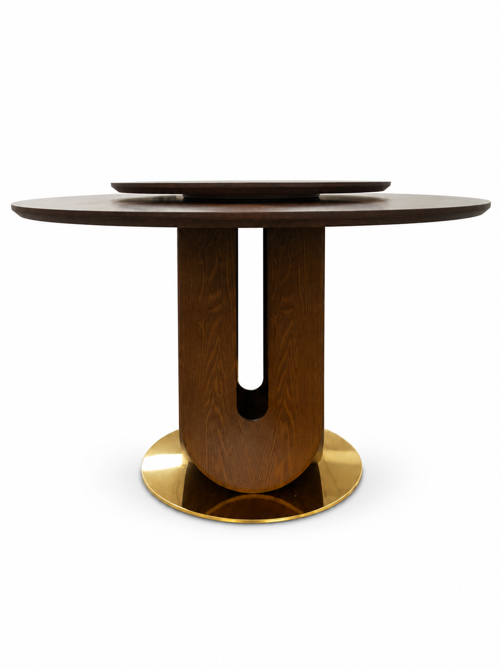 Low front view of the Vincennes Round Wood Dining Table, showing its wooden tabletop and raised turntable, curved U-slot pedestal and circular gold-tone base on white.