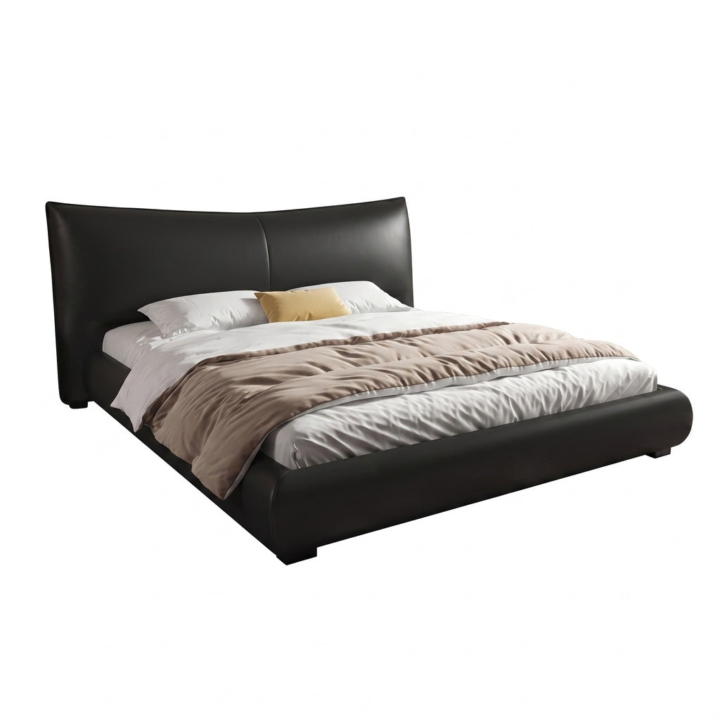 Oberon Bed left-side view with black upholstered frame, white bedding, beige throw, and curved headboard