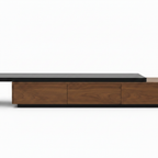 Sarvienne Coffee Table detail of plain brown wood cabinet panels and low black plinth