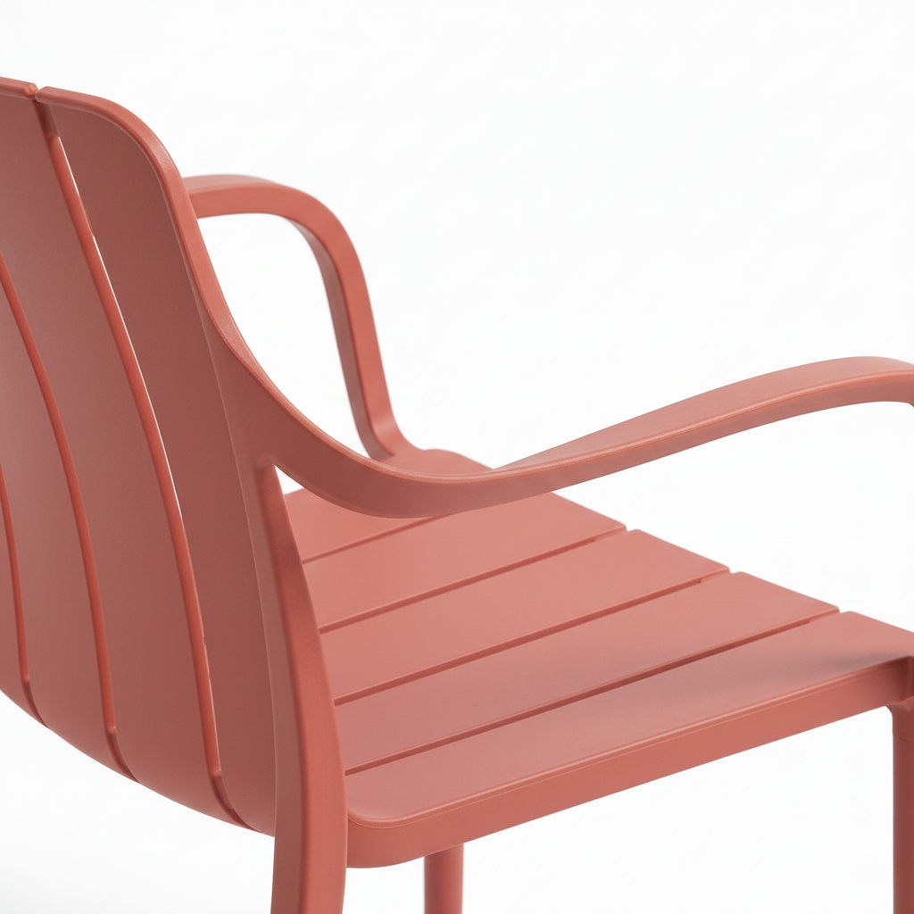 Close-up detail of the Sauremont Dining Chair armrest, featuring sculpted upholstery fabric texture and solid wood frame j
