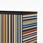 Viva Sideboard Close-up of Viva Sideboard black top edge, striped panels, and cabinet corner on white.