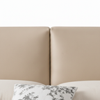 Alcott Bed side view showing the upholstered bed frame on a white background