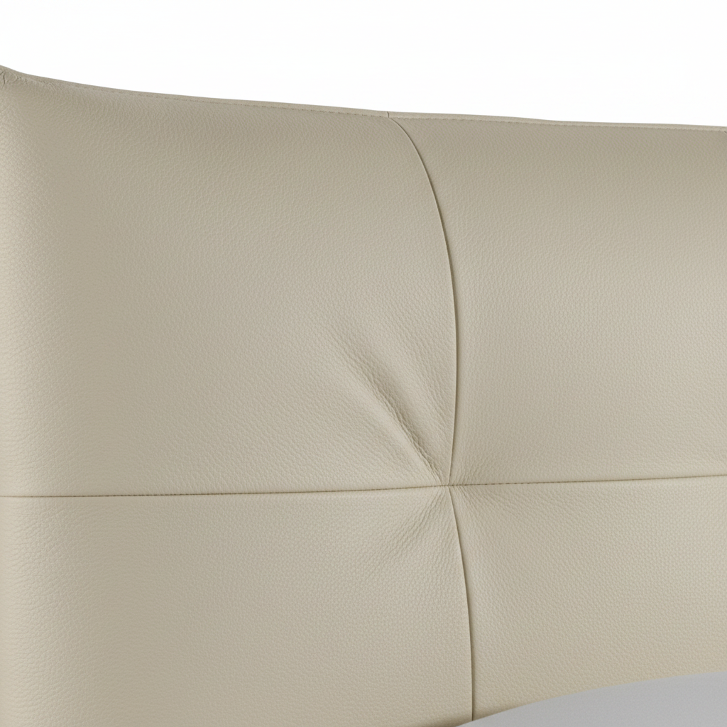 Amandelle Italian Leather Bed close-up of headboard detail on a white background