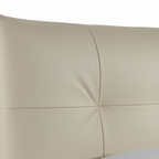 Amandelle Italian Leather Bed close-up of headboard detail on a white background