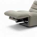 Aubecourt Accent Chair right-side close-up of extended footrest, reclining mechanism, and base on a white background