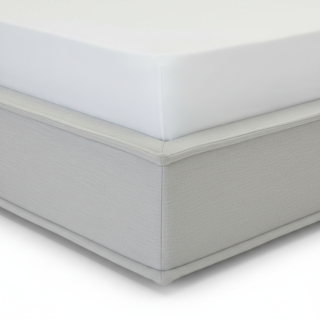 Bressac Bed close-up of side frame detail on a white background