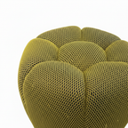 Cielmont Vercenne Stool close-up of olive-green open-mesh fabric and segmented seam detail on a white background