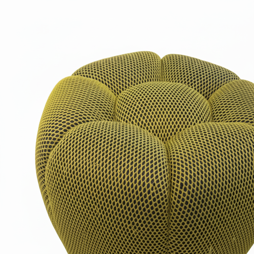 Cielmont Vercenne Stool close-up of olive-green open-mesh fabric and segmented seam detail on a white background