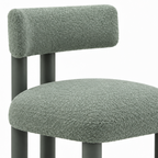 Close-up of green upholstery on Almerique Dining Chair