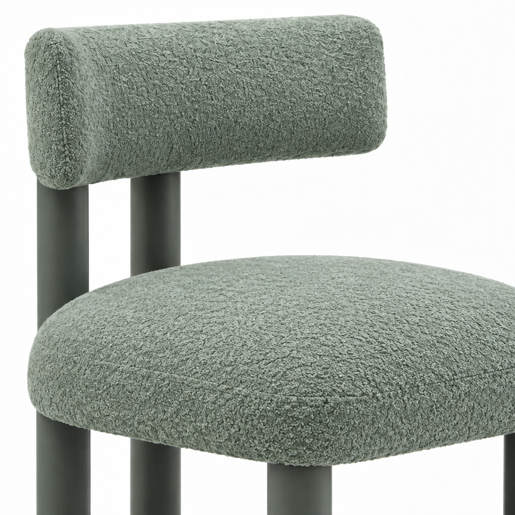 Close-up of green upholstery on Almerique Dining Chair