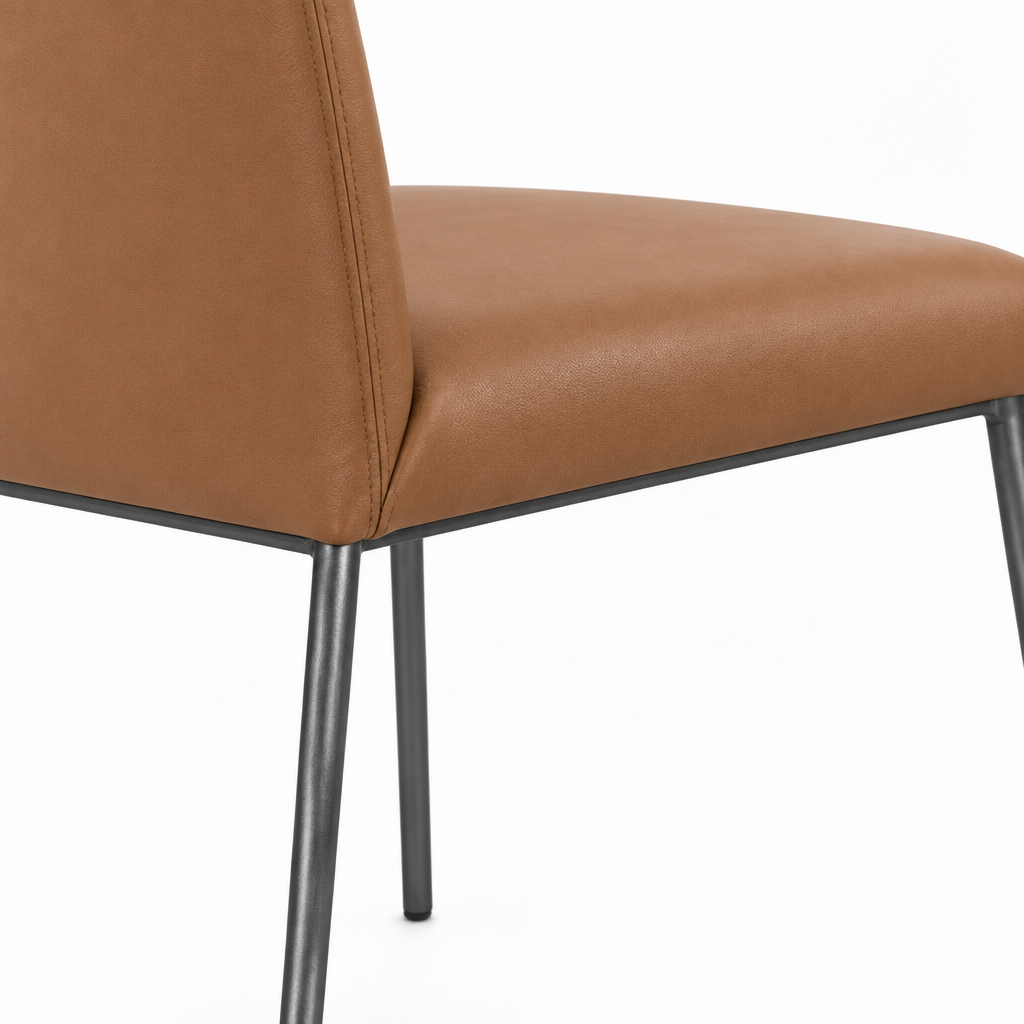 Close-up of the brown upholstery on Adorienne Dining Chair
