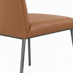 Close-up of the brown upholstery on Adorienne Dining Chair