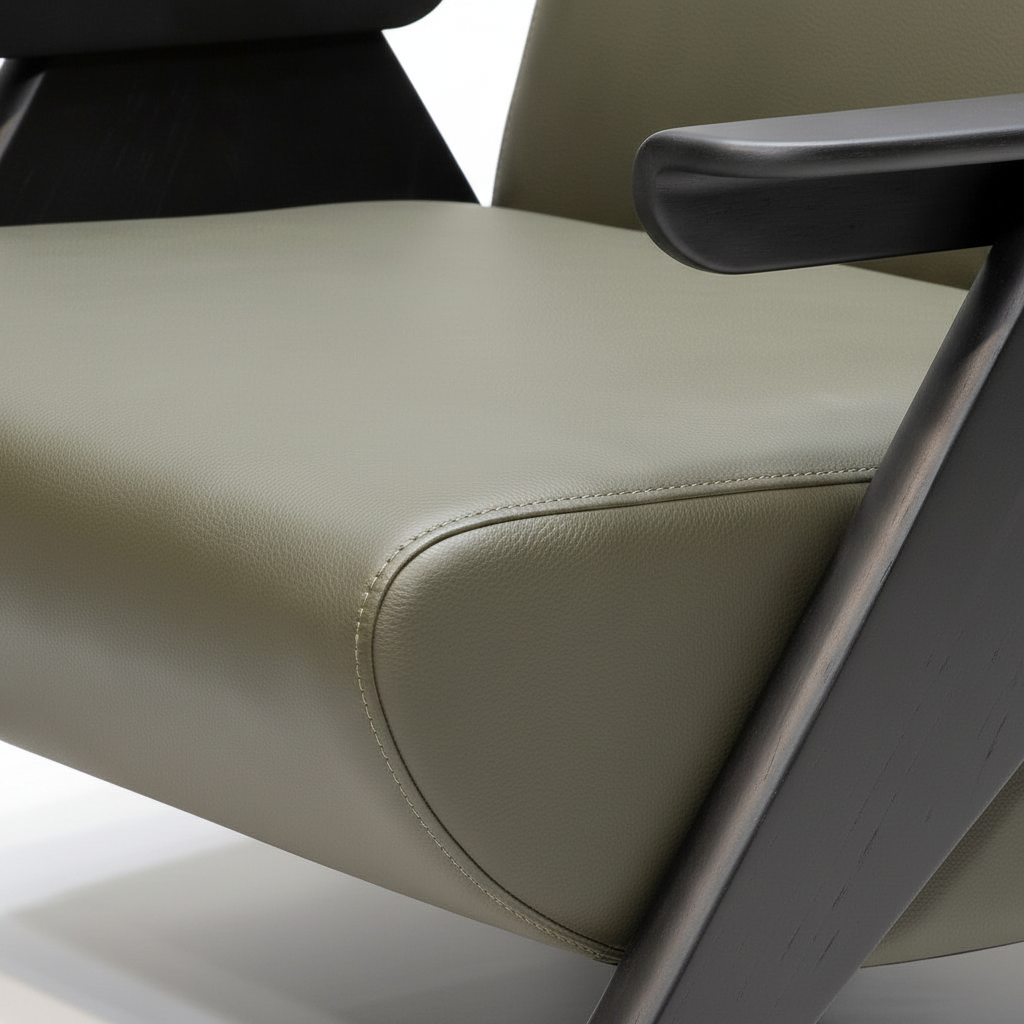 Dovarin Accent Chair leather upholstery detail showing the textured surface and padded construction.