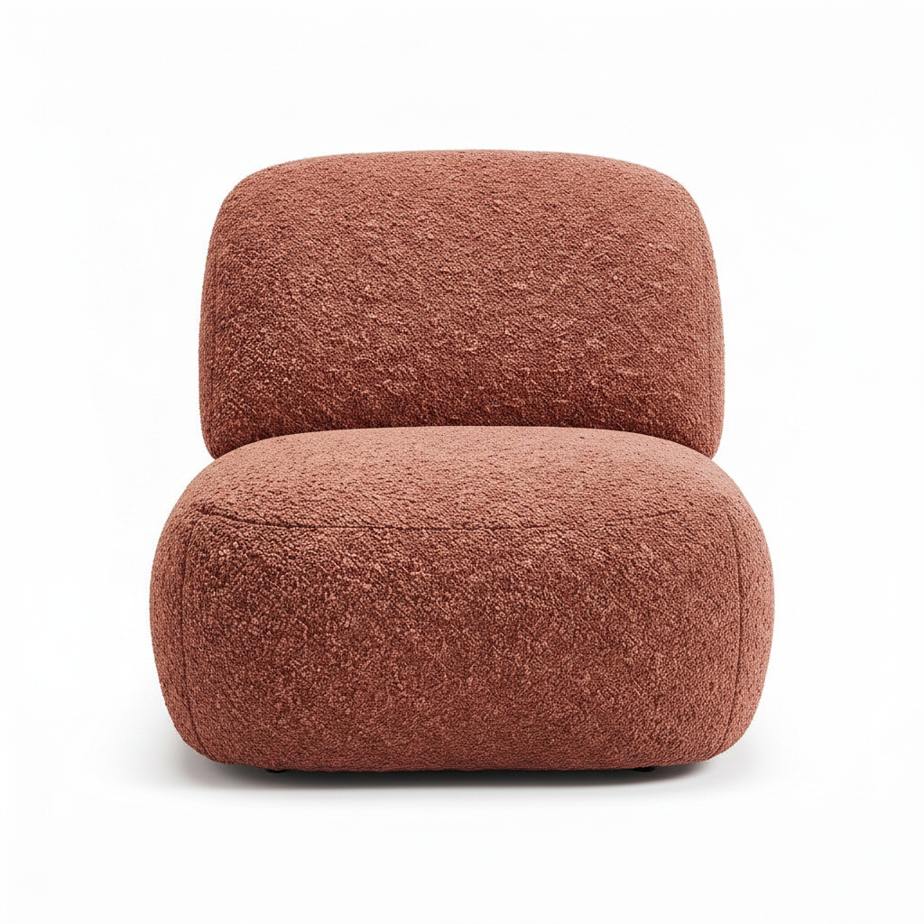 Durevia Accent Chair front view showing the upholstered seat, separate back cushion, curved arms, and supportive base.
