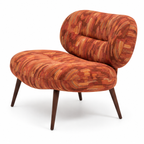 Foscelle Accent Chair — rust patterned upholstery, three-quarter view facing left