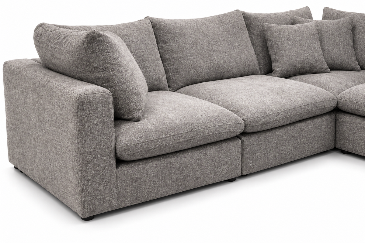 Greymere Granite Sectional — arm and cushion detail