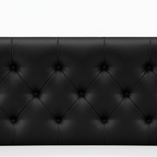 Haverique Bed black leather headboard with tufted diamond stitching and button details on a white background