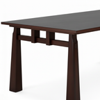 Close-up of Jorisse Dining Table carbon steel leg and tabletop connection