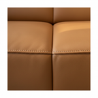 Close-up of the caramel-brown Italian leather upholstery and stitching on the Mavero Leather Sofa