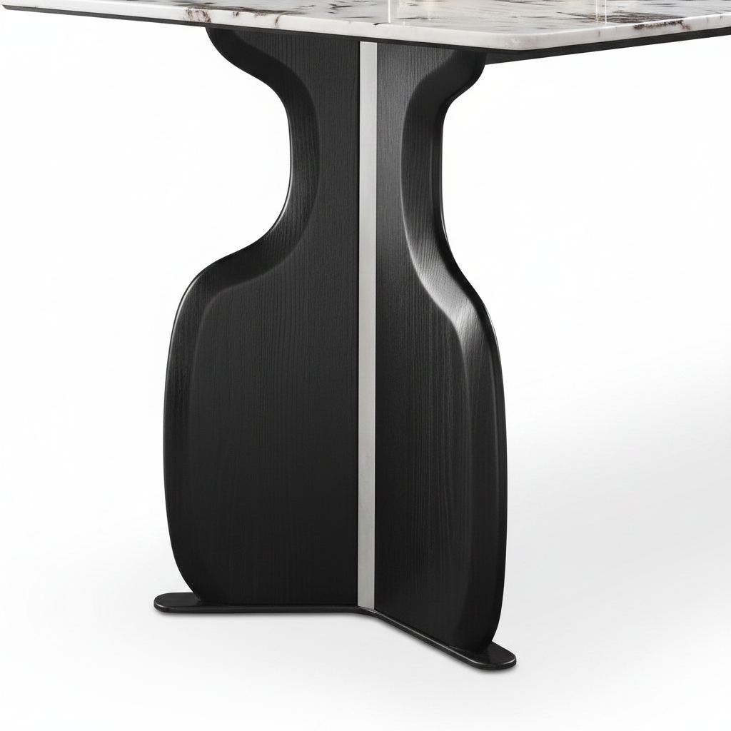 Close-up of the sculptural solid ash wood support on Elysian Marble Dining Table