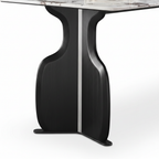 Close-up of the sculptural solid ash wood support on Elysian Marble Dining Table