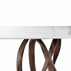 Close-up of Marcelline Dining Table white marble edge and intertwined wood loop support connection