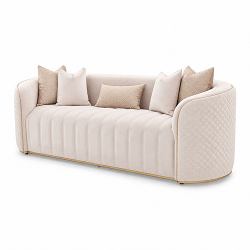 Ariana Sofa in beige upholstery with gold trim, curved quilted arms and five pillows, left-front view
