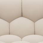 Close-up of the ivory fabric texture and channel quilting on the Cielmont Ardin Sofa