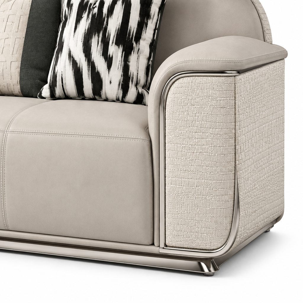 Ardellon Sofa ivory leather arm panel, patterned cushion and silver base close-up