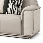 Ardellon Sofa ivory leather arm panel, patterned cushion and silver base close-up