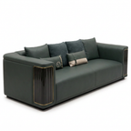 Rovessa Sofa in dark green leather with fluted arm panels and gold trim, left-front 45-degree view