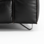 Cormaro Sofa black leather lower base and metal leg close-up