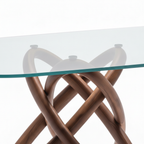 Close-up of the transparent glass edge and support connection on Elaris Glass Dining Table