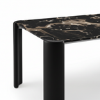 Close-up of Urbelle Dining Table black leg and tabletop connection
