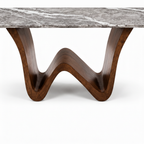 Close-up of the solid ash wood support on Auremont Marble Dining Table