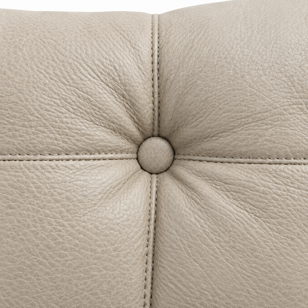 Quessaro Leather Sofa tufted leather cushion stitching and button detail close-up
