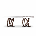 Marcelline Dining Table straight-on front view with white natural marble top, intertwined wood bases, and oval metal plates