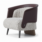 Mavero accent chair in plum brown leather and white boucle, mirrored three-quarter view on white background