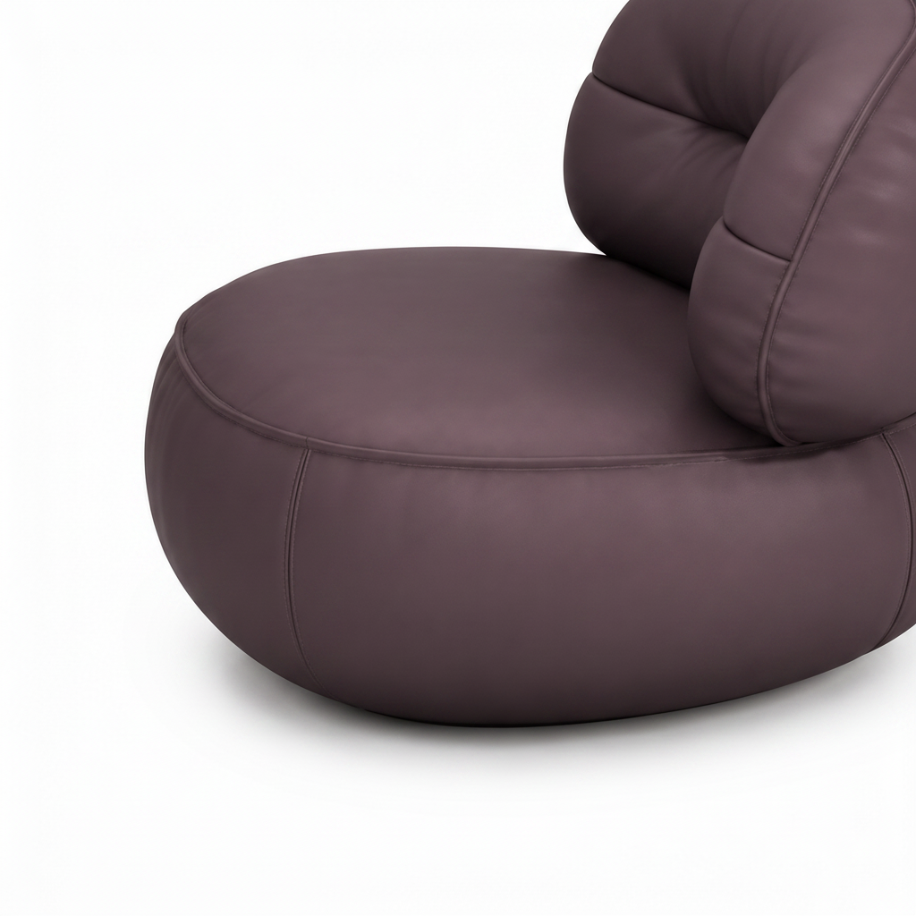 Gavelle leather accent chair rounded upholstered base and seam detail on white background