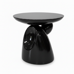 Ismeron Decor rear right three-quarter view showing the back of the glossy black sculptural base.