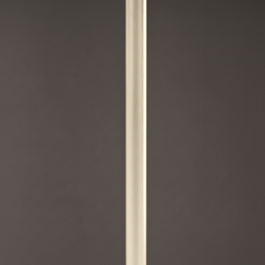 Close-up of the gold metal trim and dark panel on the Valmere End Table