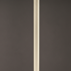 Close-up of the gold metal trim and dark panel on the Valmere End Table