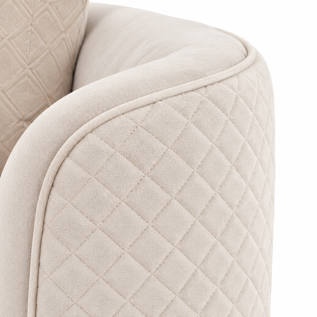 Close-up of Ariana Sofa beige quilted arm upholstery and curved piping